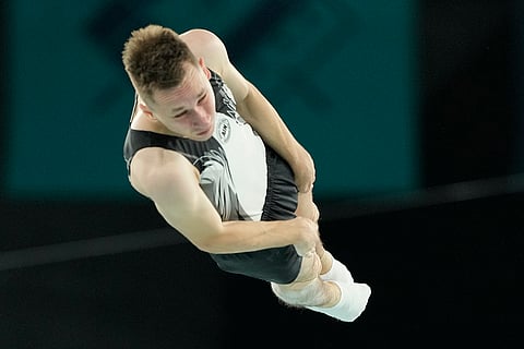 Pierre Gouzou of France competes during men's trampoline finals